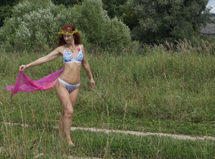 With a pink shawl