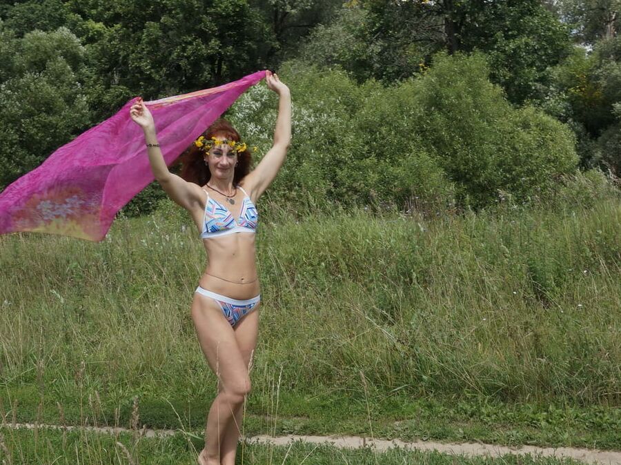 With a pink shawl