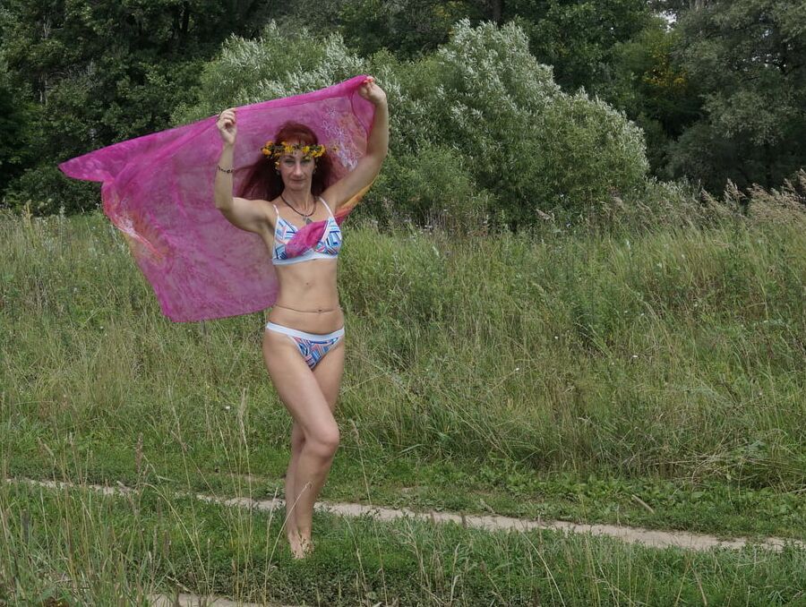 With a pink shawl