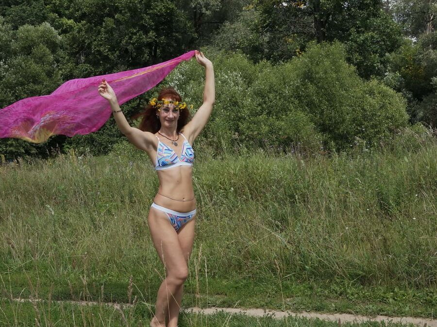 With a pink shawl