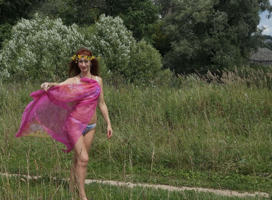 With a pink shawl