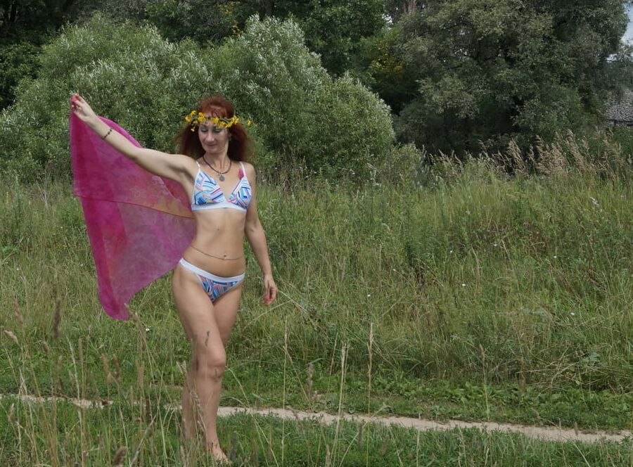 With a pink shawl
