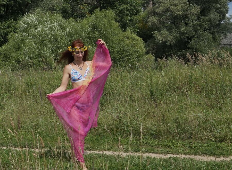 With a pink shawl
