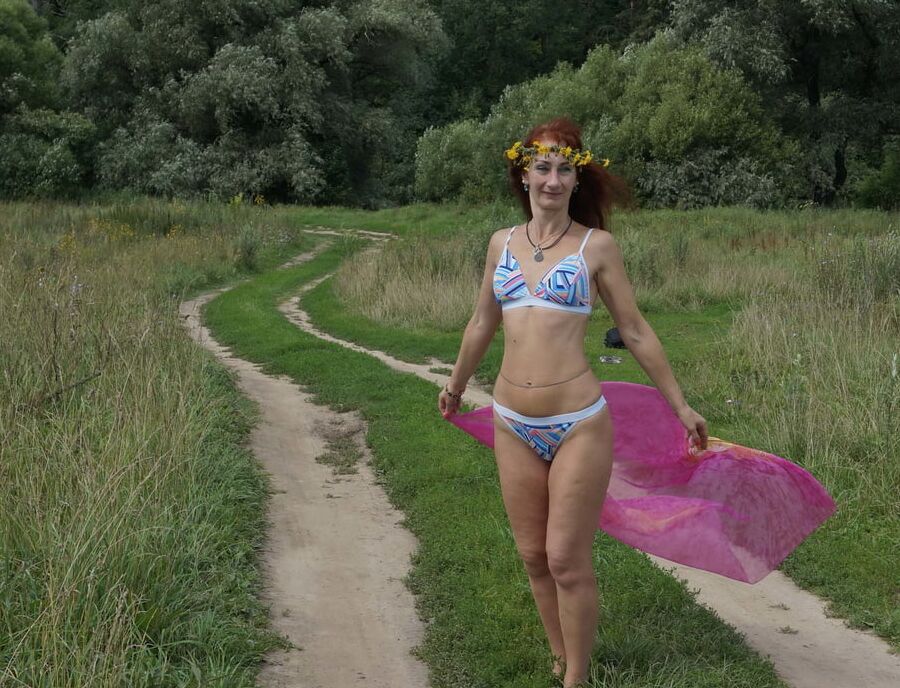 With a pink shawl