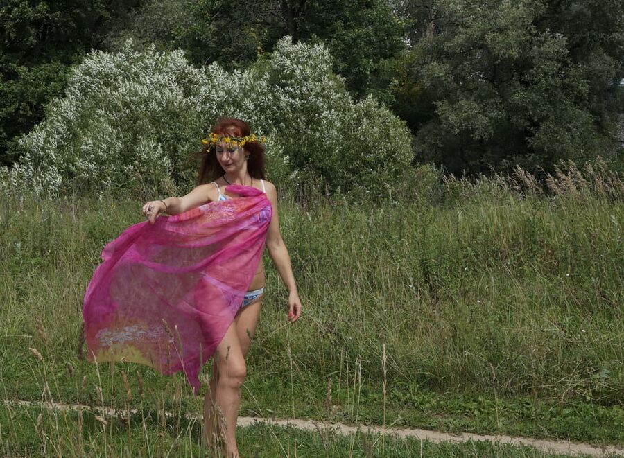 With a pink shawl