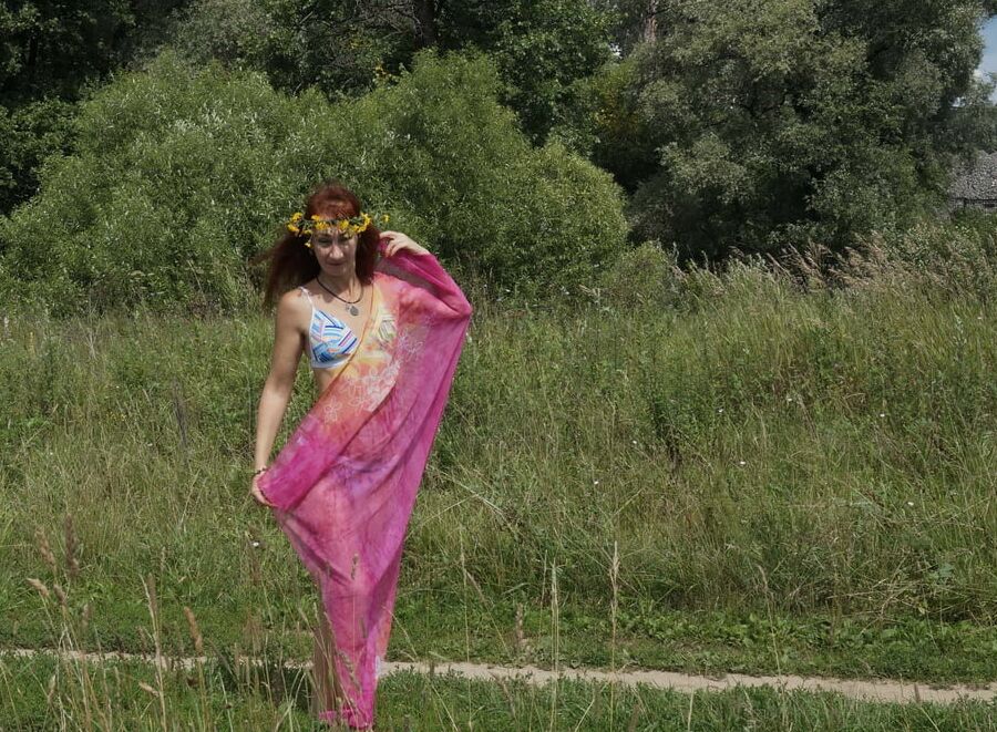 With a pink shawl
