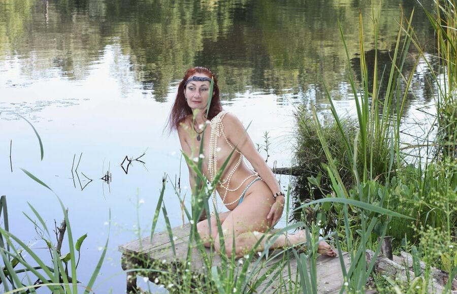 Nude on planked footway