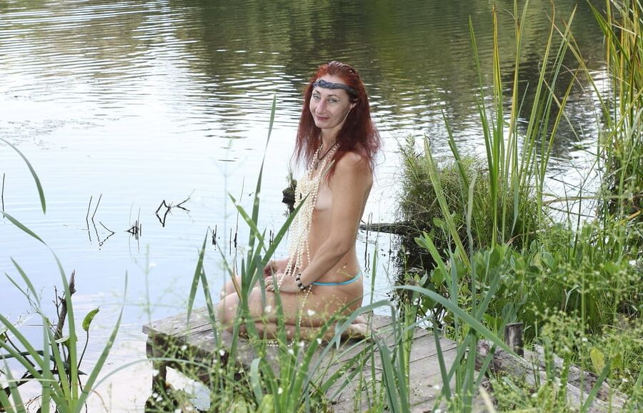 Nude on planked footway