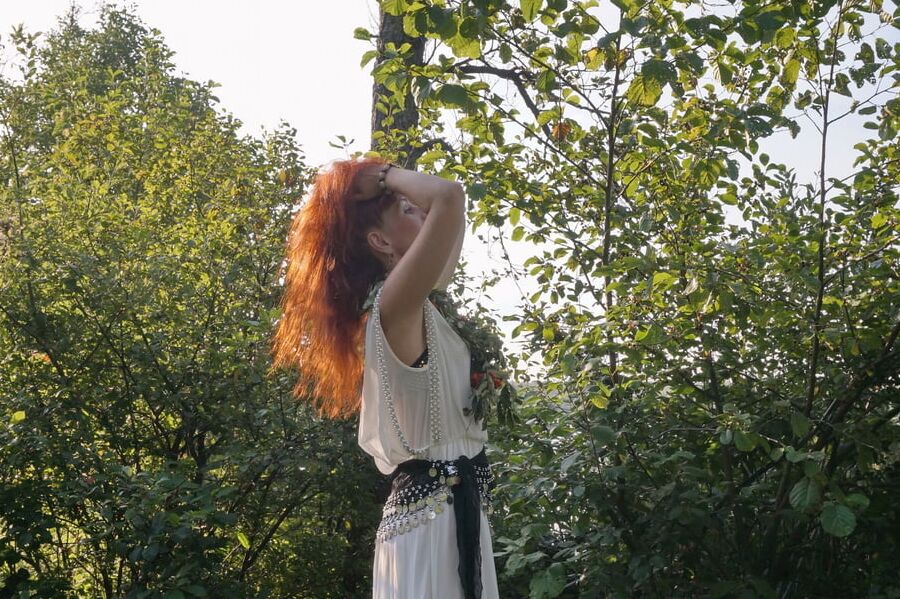 Flame Redhead near Lake