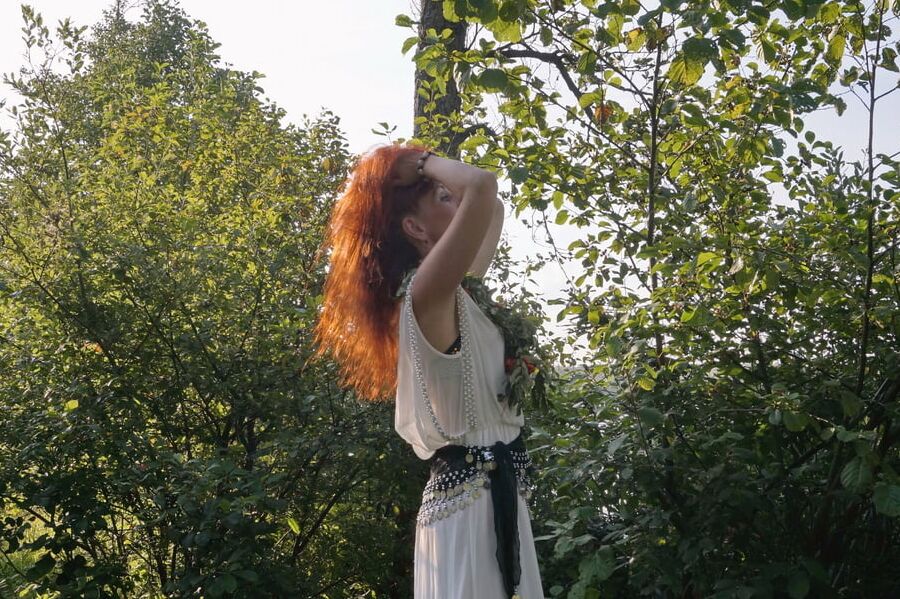 Flame Redhead near Lake