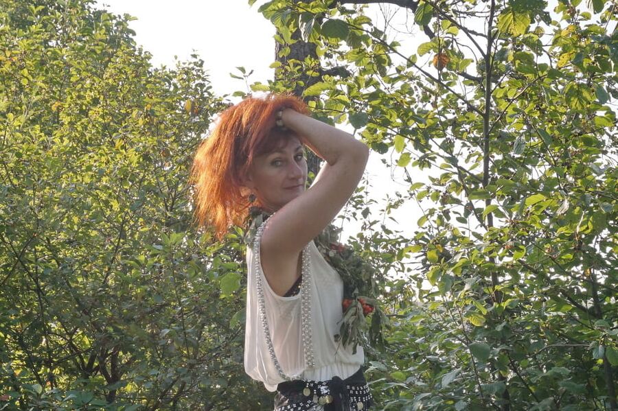 Flame Redhead near Lake