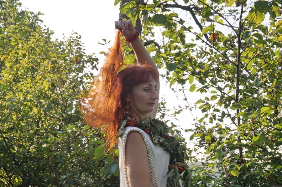 Flame Redhead near Lake