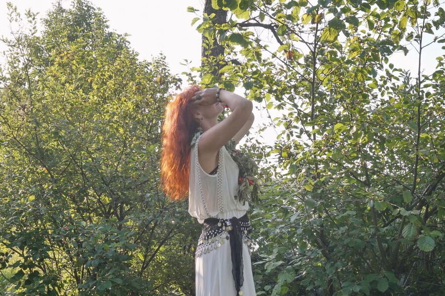 Flame Redhead near Lake