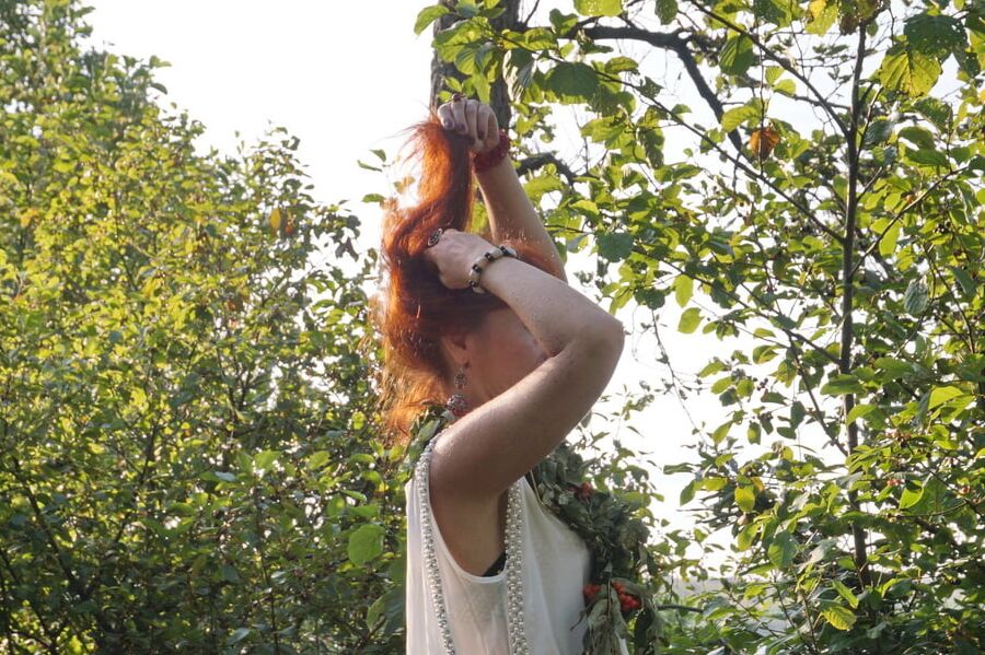 Flame Redhead near Lake