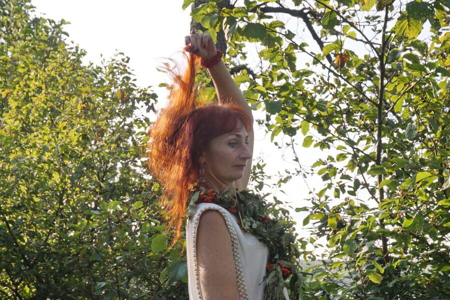 Flame Redhead near Lake