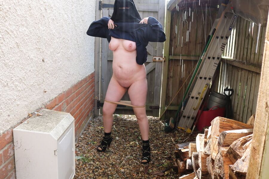 Burqa Outdoors Flashing in the Rain