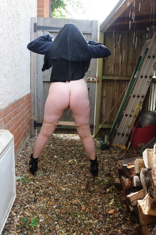Burqa Outdoors Flashing in the Rain
