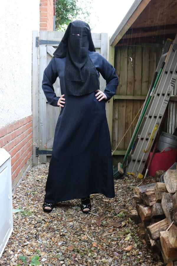 Burqa Outdoors Flashing in the Rain