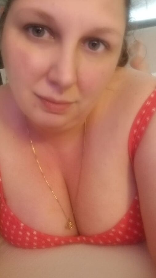 Relaxing poolside after a long day being a dance mom milf