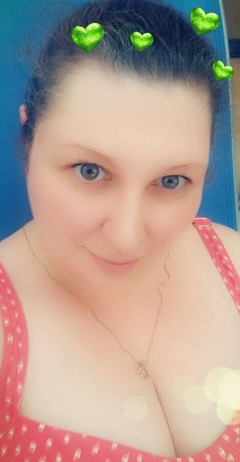 Relaxing poolside after a long day being a dance mom milf