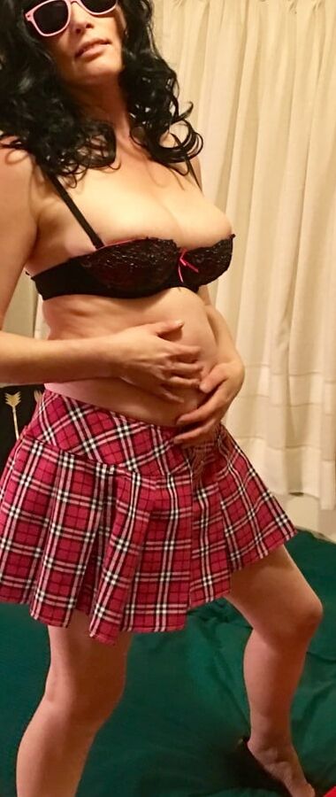Twisted69 models schoolgirl outfit