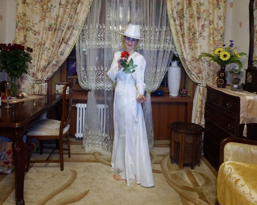 In Wedding Dress and White Hat