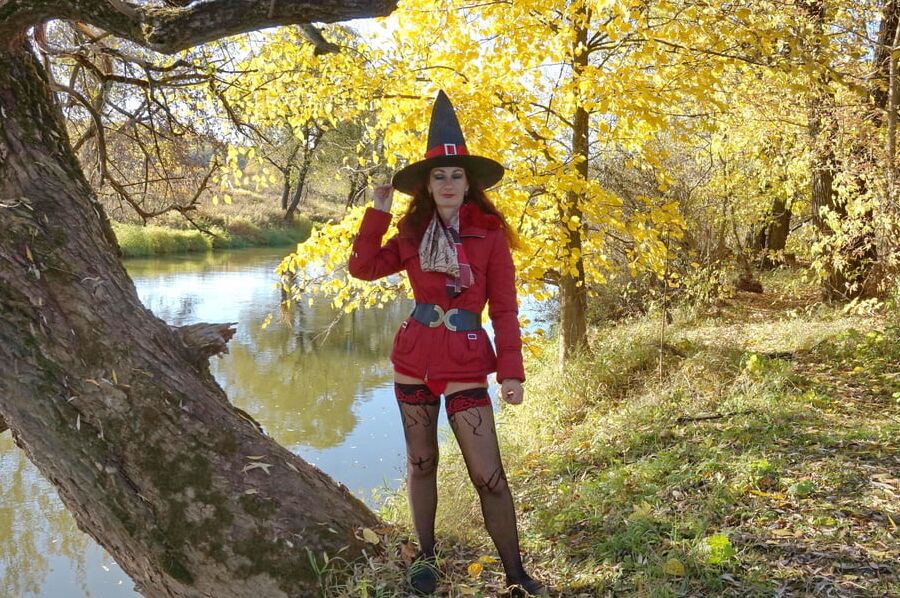 In Hat on Yellow Leaves Background