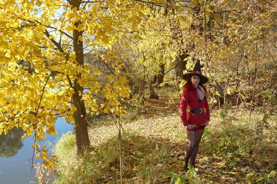 In Hat on Yellow Leaves Background