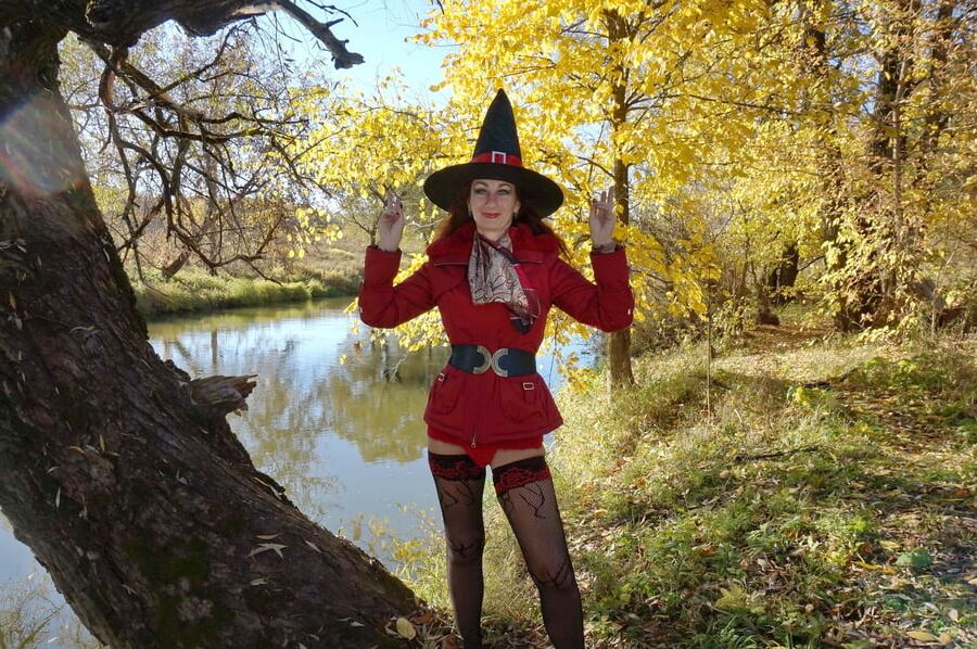 In Hat on Yellow Leaves Background