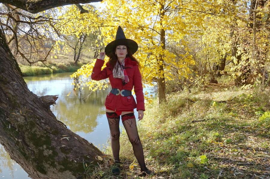In Hat on Yellow Leaves Background