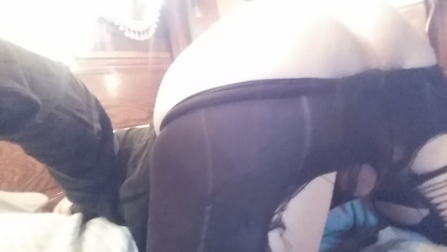 Ass out in ripped up tights.