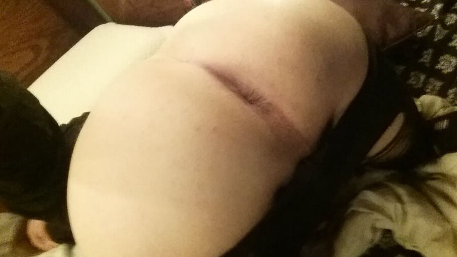Ass out in ripped up tights.