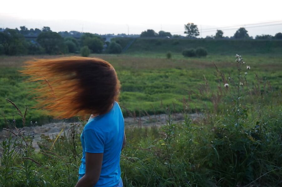 Flamehair in evening on the bridge