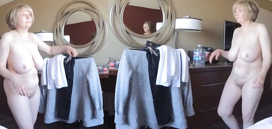 Naked in hotel window