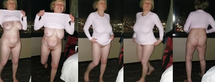 Naked in hotel window
