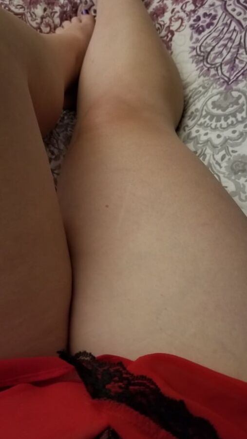 Naughty housewife tease black heels and red lingerie. Milf