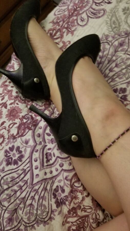 Naughty housewife tease black heels and red lingerie. Milf