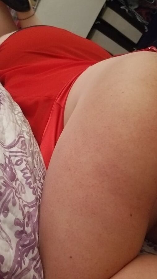 Naughty housewife tease black heels and red lingerie. Milf