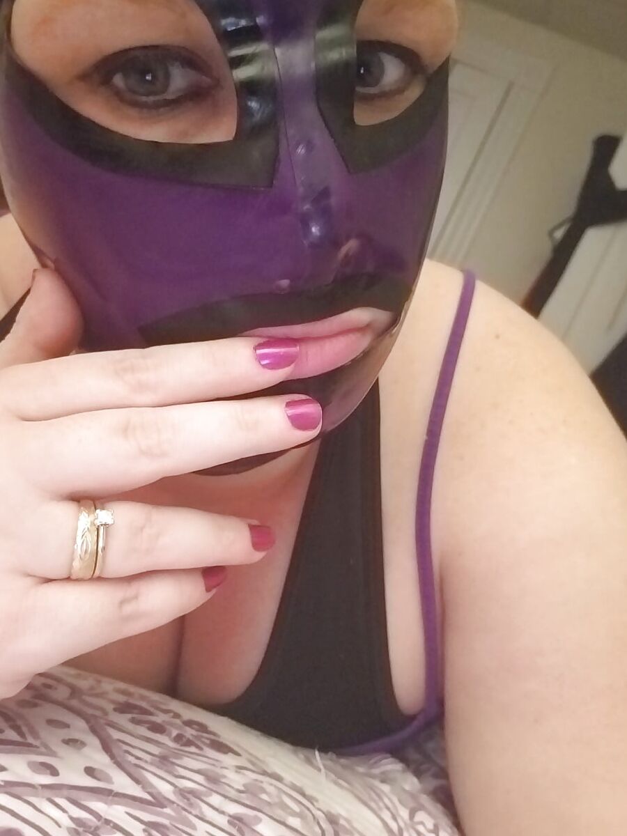 Latex Hoods are so much fun and set the mood just right....