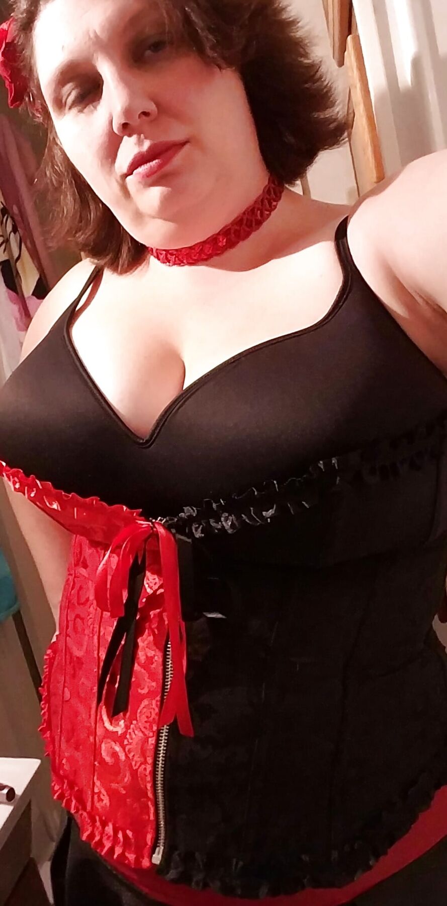 Corsets and other fun of a busty little housewife...