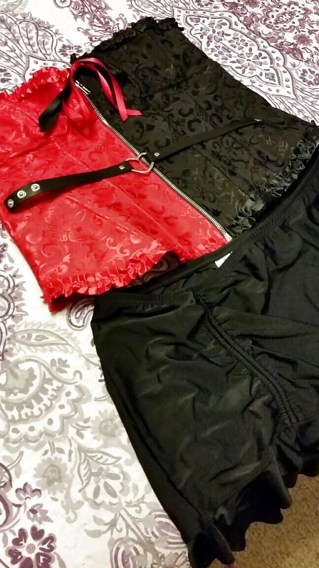 Corsets and other fun of a busty little housewife...