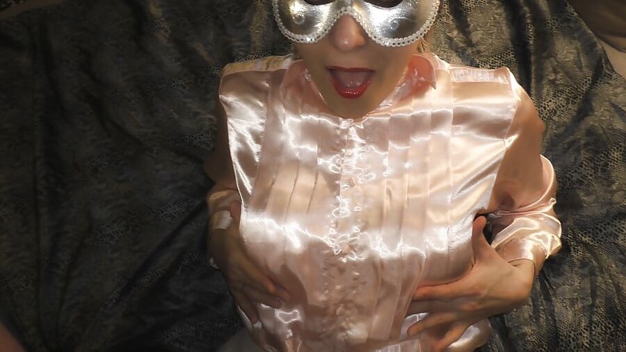 Pink satin blouse and white skirt