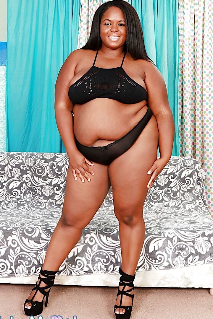 Ebony BBW Olivia Leigh rides a white dick