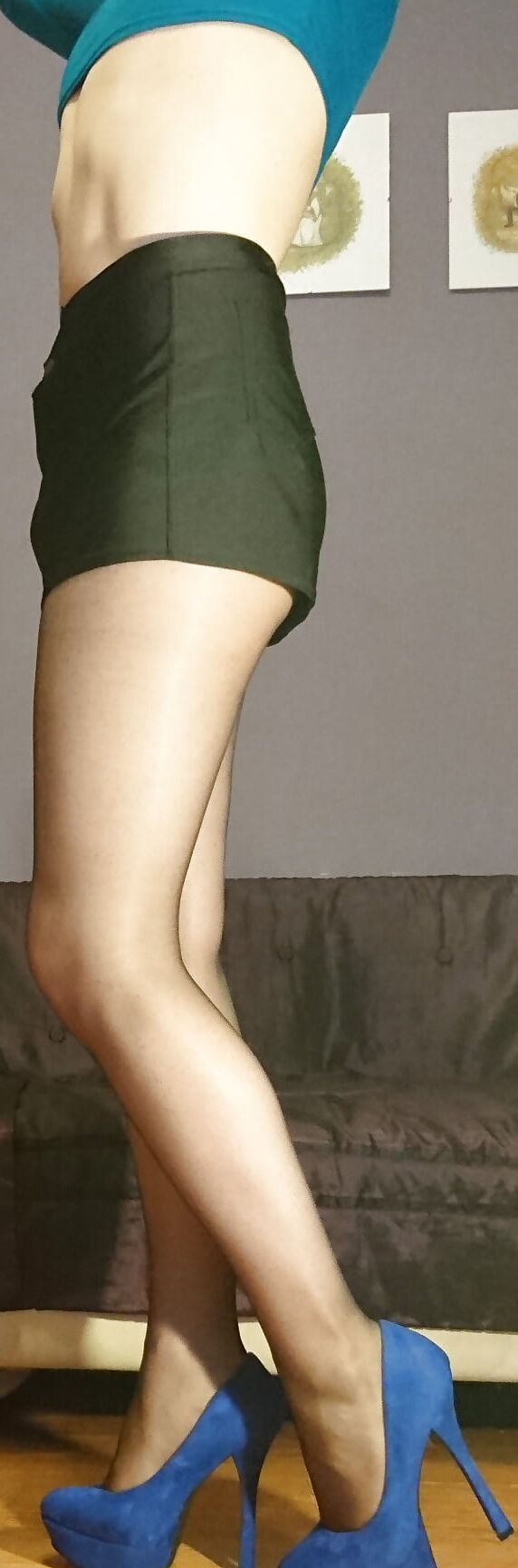 Marie crossdresser in sheer pantyhose and black shorts