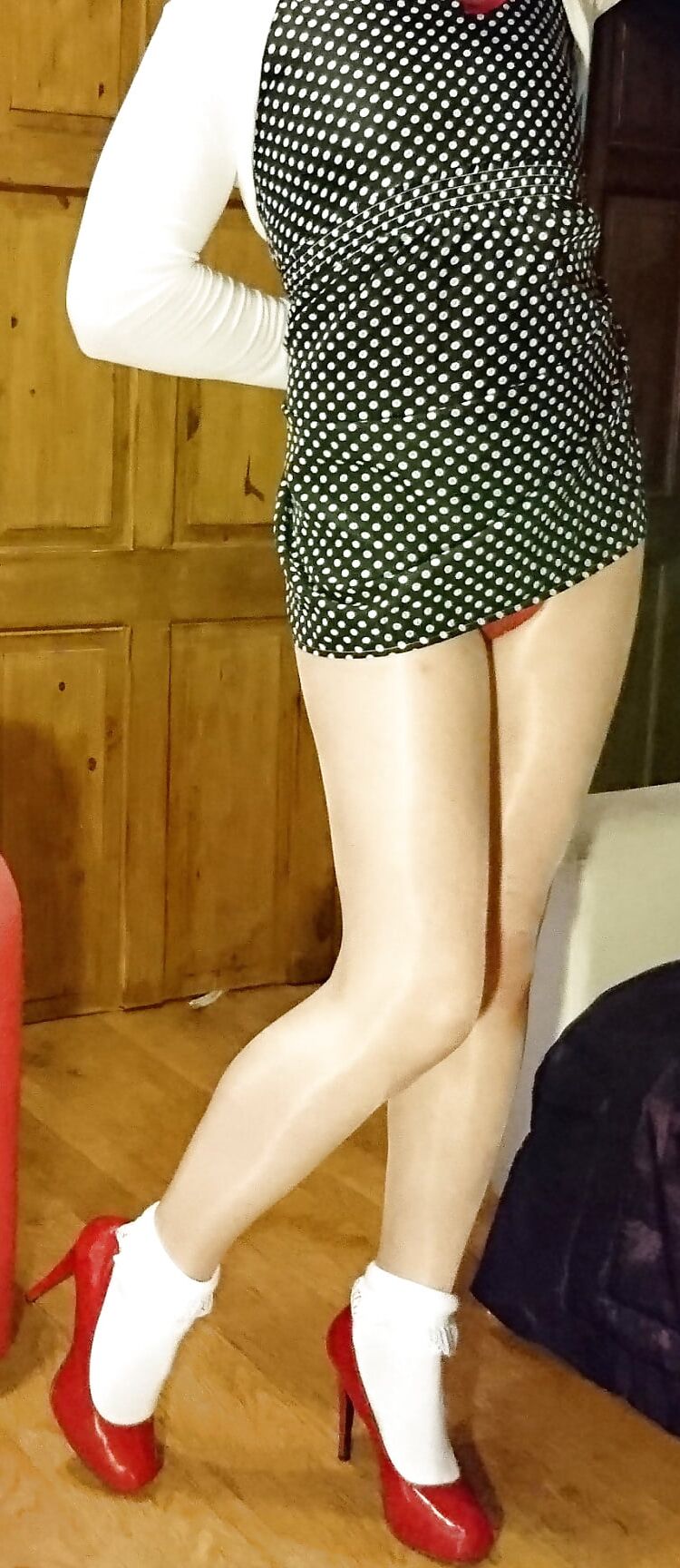 Marie crossdresser in polka-dots and frilly socks
