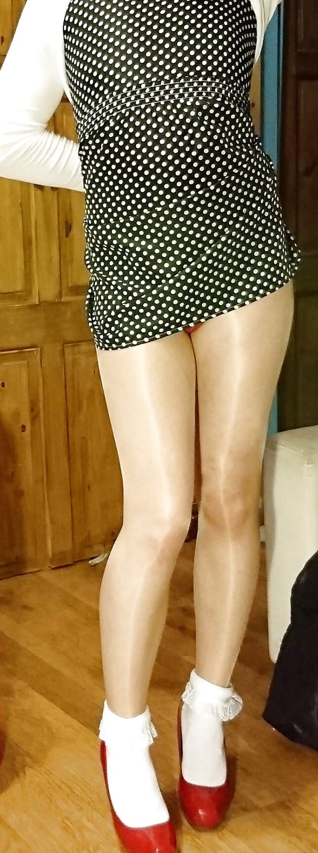 Marie crossdresser in polka-dots and frilly socks