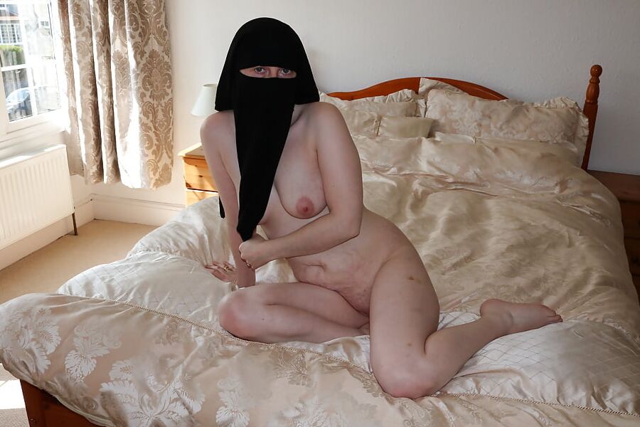 Wife posing naked in niqab