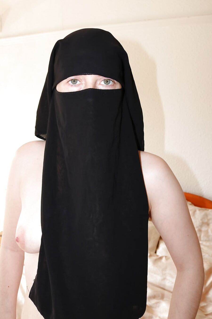 Wife posing naked in niqab