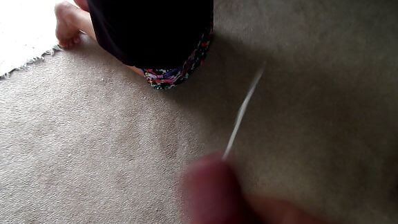 On her knees sucking my cock and balls
