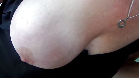 On her knees sucking my cock and balls